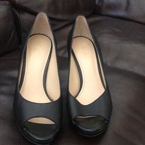 Black leather peep toe pumps